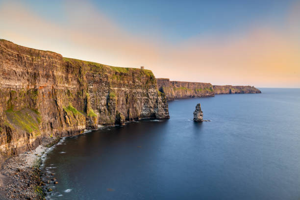 Cliffs of Moher 214 meters high Cliffs of Moher with O'Briens's Tower galway stock pictures, royalty-free photos & images
