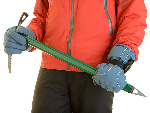 Climber Holding Ice Axe in Two Hands stock photo