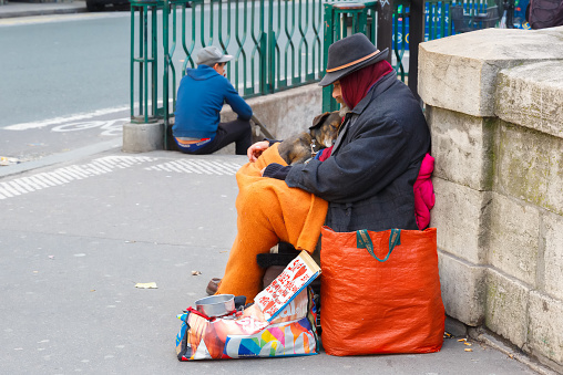 Clochard, homeless with dog in Paris