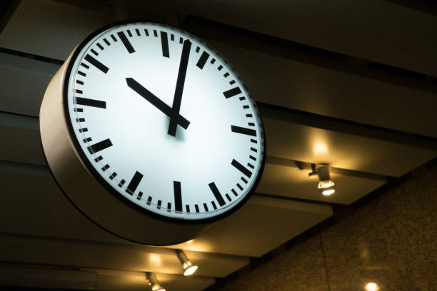 Clock in the subway background stock photo
