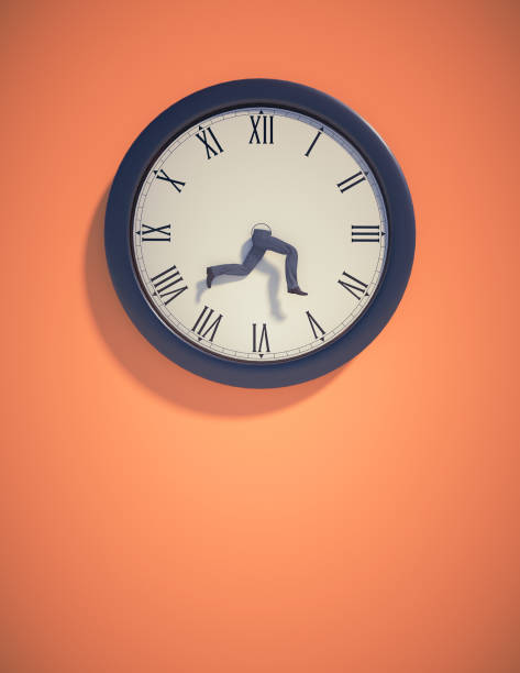 Clock on wall with running legs. stock photo