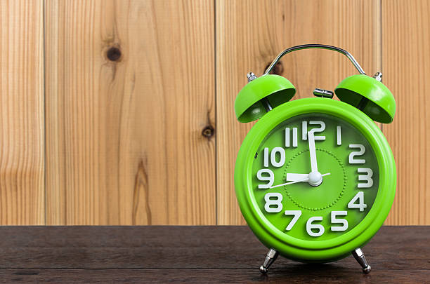 Clock on Wooden Floor with Wood Background