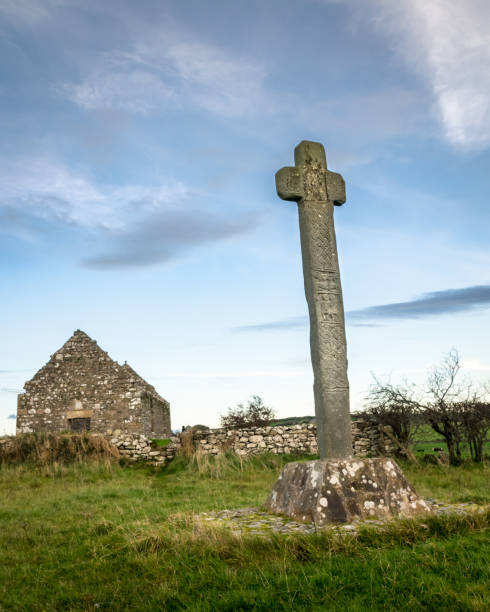 Cloncha High Cross This the High Cross at Clonca Church in Donegal Ireland. It is on the site of a monastery that was founded in the 6th century. inishowen peninsula stock pictures, royalty-free photos & images