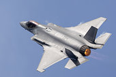 istock Close top view of a F-35C Lightning II  with afterburner on 1366679649