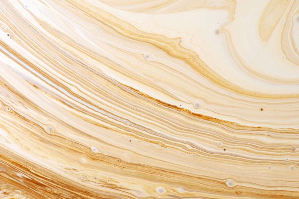 Close up abstract caramel shapes Close-up abstract caramel shapes latte art in coffee. Liquid texture background macro. cream dairy product photos stock pictures, royalty-free photos & images