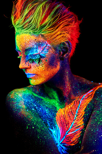 close up color UV portrait on black bacground
