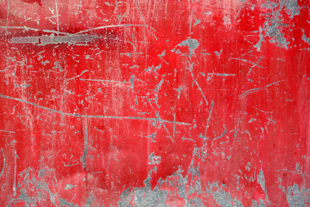 close up grunge metal plate surface of steel door old vivid red color obsolete gate texture is peeled and full of scratches, abstract industrial background peeling off stock pictures, royalty-free photos & images