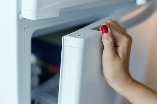Close Up Hand Opens Fridge Stock Photo - Download Image Now - iStock