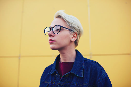 Close Up Image Of Cute Female Blonde Hipster With Short Haircut