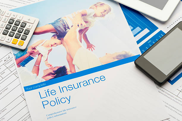 Close up of a Life insurance policy Close up of a Life insurance policy with family image. The included image can be found in my portfolio. Image  #37803180 life insurance stock pictures, royalty-free photos & images