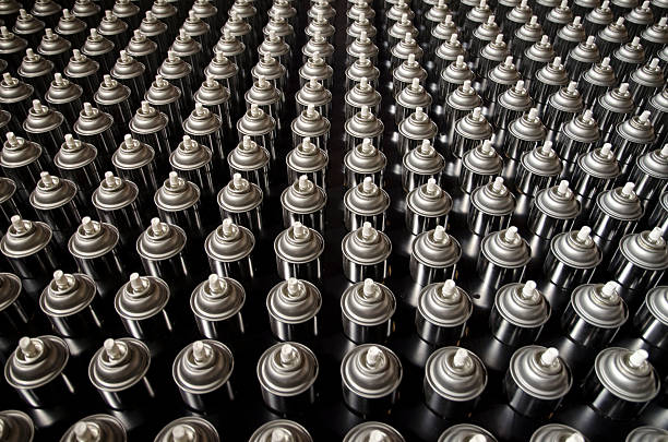 Close up of a row of aerosol cans stock photo