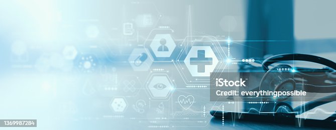 istock Close up of a stethoscope and digital tablet with virtual electronic medical record of patient on interface.Digital healthcare and network on modern virtual screen, DNA medical technology and futuristic concept. 1369987284