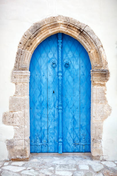 Close up of an old wooden blue door. stock photo