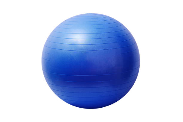 Close up of an orange fitness ball isolated on white background stock photo