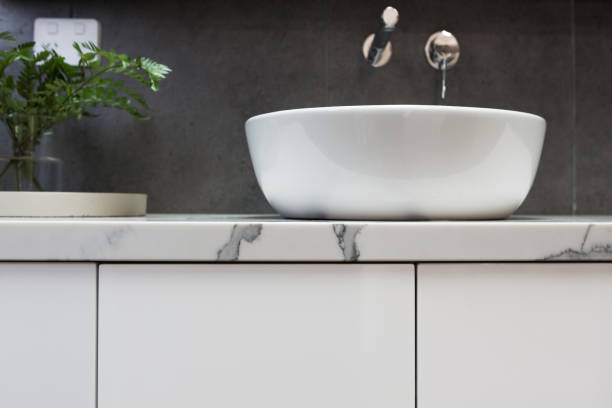 Close up of bathroom basin on a marble top vanity stock photo