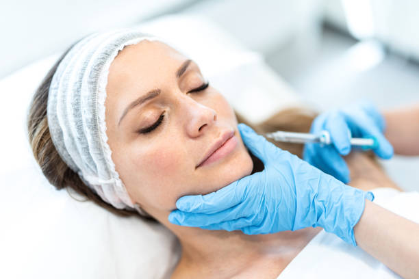 Close up of beauty treatment with Botox Close up of young woman receiving beauty treatment with Botox. collagen stock pictures, royalty-free photos & images