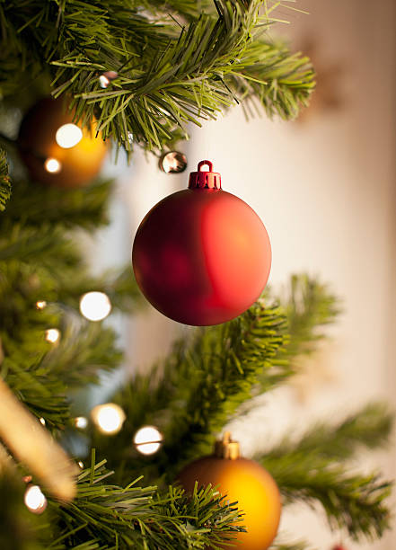 Close up of Christmas ornament on tree  christmas tree close up stock pictures, royalty-free photos & images