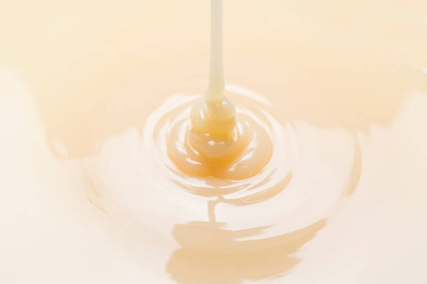 close up of condensed milk background stock photo