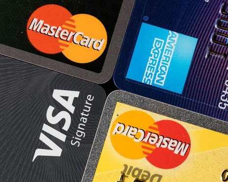 Close Up Of Credit Card Issuer Brands And Logos Stock Photo - Download Image Now - iStock