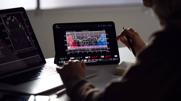 https://media.istockphoto.com/photos/close-up-of-female-share-trader-at-desk-with-stock-price-data-on-picture-id1266756931?k=20&m=1266756931&s=612x612&w=0&h=LDcxVor2Pd7jTiF6XCCBJZUpsTXLIadaZ5vnVZzmNFM=