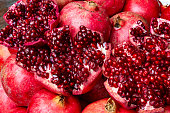 istock Close up of fresh and juicy pomegranate 1073815244