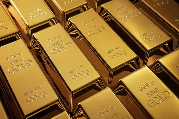 Close up of gold bars Close up of gold bars with copy space gold bar stock pictures, royalty-free photos & images