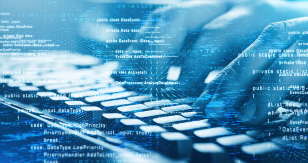Close Up Of Hands On A Computer Keyboard - Coding, Programming, Software Development, Cyber Security Perfectly usable for topics like software development, IT support or hacking and computer crimes. hackathon stock pictures, royalty-free photos & images