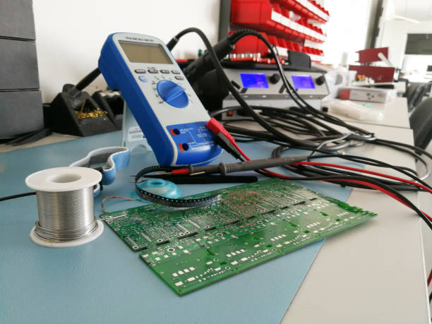 Close up of manual electronic tools and equipment on the electronics engineer desktop stock photo