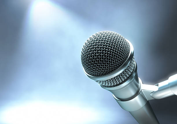 Close up of microphone and fog stock photo