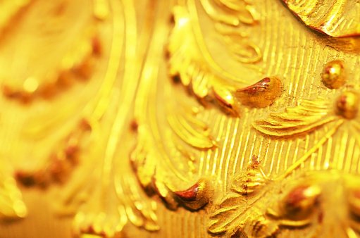 Close up of old baguette of the painting, gold carved leaves. - Image