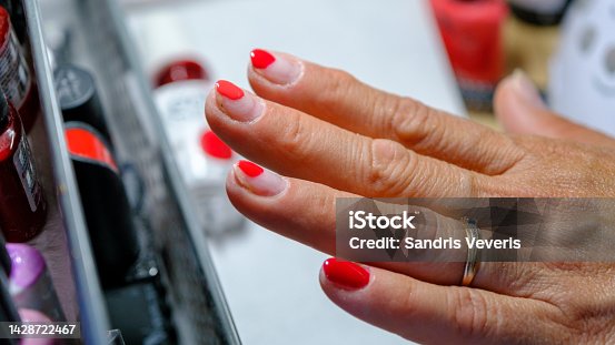 istock Close up of process france manicure at beauty salon 1428722467