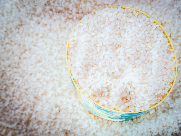 close up of rice in bowl stock photo