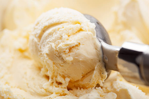 Close up of scoop of vanilla ice cream stock photo