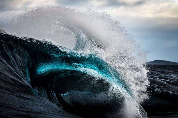 Close up of strong blue ocean wave stock photo