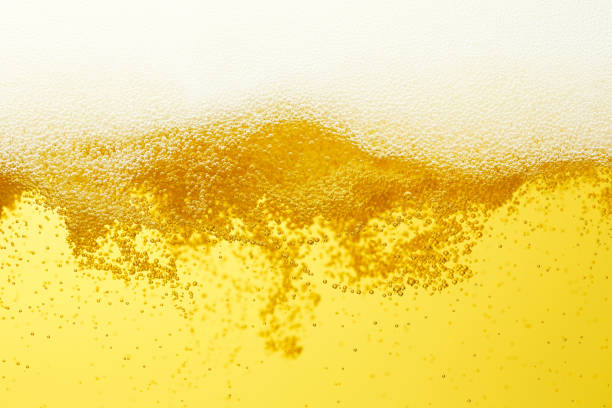 close up of the beer close up of the beer frothy drink stock pictures, royalty-free photos & images