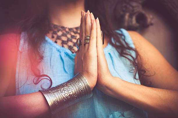 close up of woman hands in namaste gesture close up of woman hands in namaste gesture outdoor shotclose up of woman hands in namaste gesture outdoor shot namaste greeting stock pictures, royalty-free photos & images