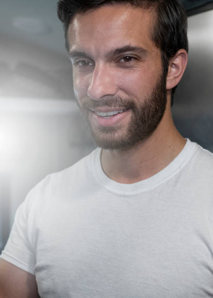 Close up of young smiling man stock photo