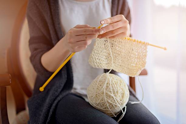 close up on woman's hands knitting - knitting bildbanksfoton och bilder