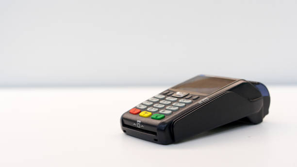 close up soft focus credit card reader  machine at white background table for  business financial about contactless payment concept close up soft focus credit card reader  machine at white background table for  business financial about contactless payment concept credit card reader stock pictures, royalty-free photos & images
