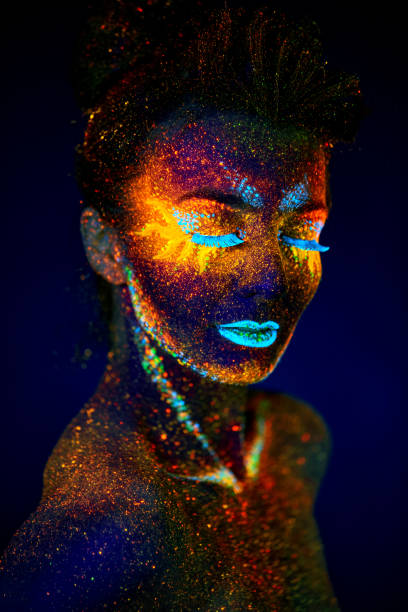 close up uv portrait glowing in a dark stock photo