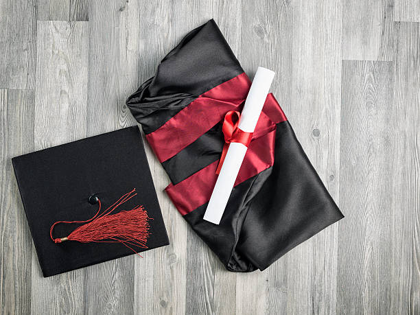 Red Graduation Gown Stock Photos, Pictures & Royalty-Free Images - iStock