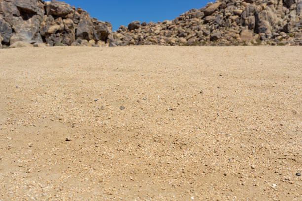 Close up view of sand with rocks in the Mojave Desert stock photo