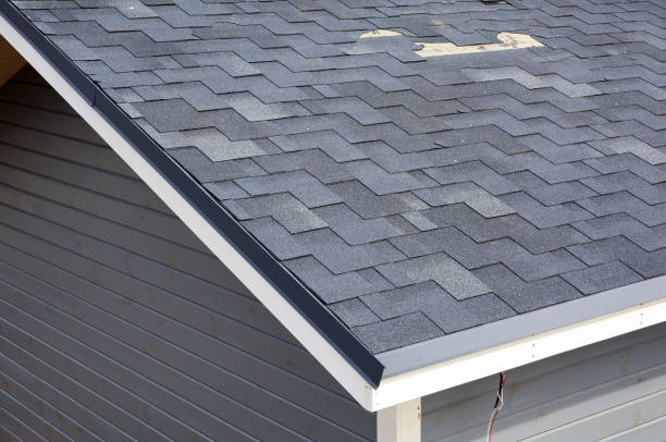 A close up view of shingles a roof damage stock photo