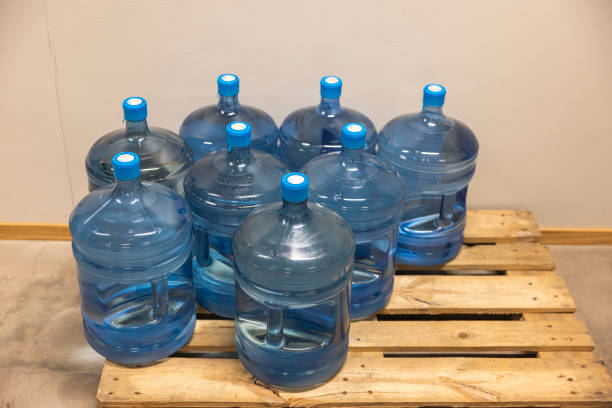 Close up view of water bottles on pallet. Health concept. Sweden. stock photo