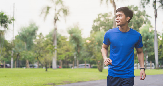 Close Up Young Asian Man Running At Outdoor Park In The Morning For Cardio  Activity Concept Stock Photo - Download Image Now - iStock
