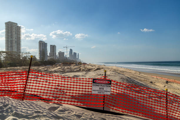 Closed sandy beach due to construction site stock photo