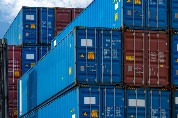 Close-up blue and red logistic container. Cargo and shipping business. Container ship for import and export logistics. Logistic industry. Container for truck transport. Freight transportation concept. stock photo