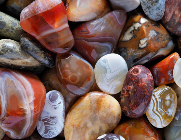 Closeup Focus Stacked Image of Polished Stones Agates, Beach Agates and Petrified Wood stock photo