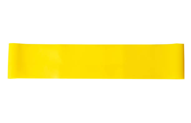 Close-up isolated yellow sport strap for stretching stock photo