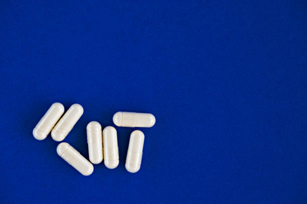 close-up of 5-htp capsules, with negative space. dietary concept. dietary supplement. stock photo